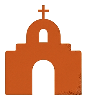 The adobe front of a mission church with an arched doorway